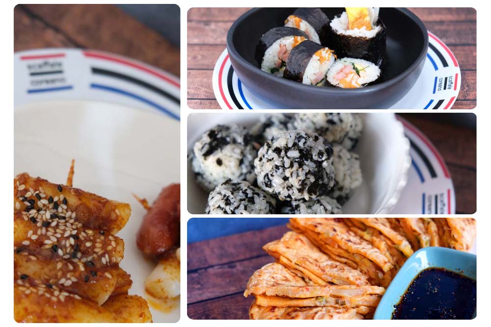 Dorisak: ovvero il pranzo al sacco coreano con Piatti fumanti di Tteokkochi, Jumeokbap, Kimchi Jeon e Gimbap con sfondo blu e piatto di Scaffale Coreano